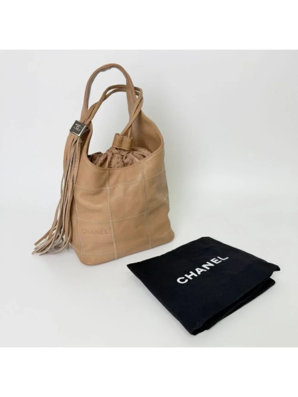 Chanel CC Logo Fringe Drawstring Handbag Leather Beige Vintage